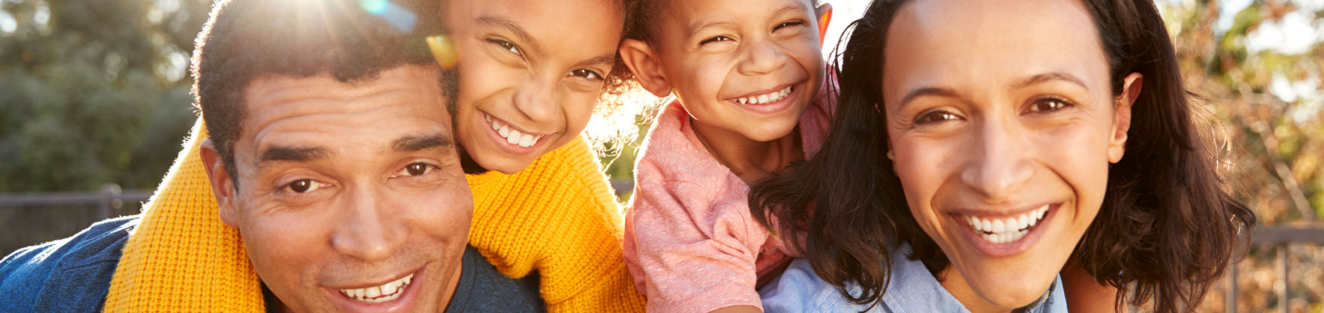 image of happy family in the sunlight